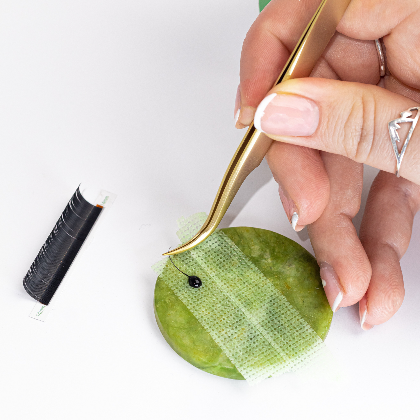 Lash Extension Adhesive Bottle with jade stone, tweezer and tape